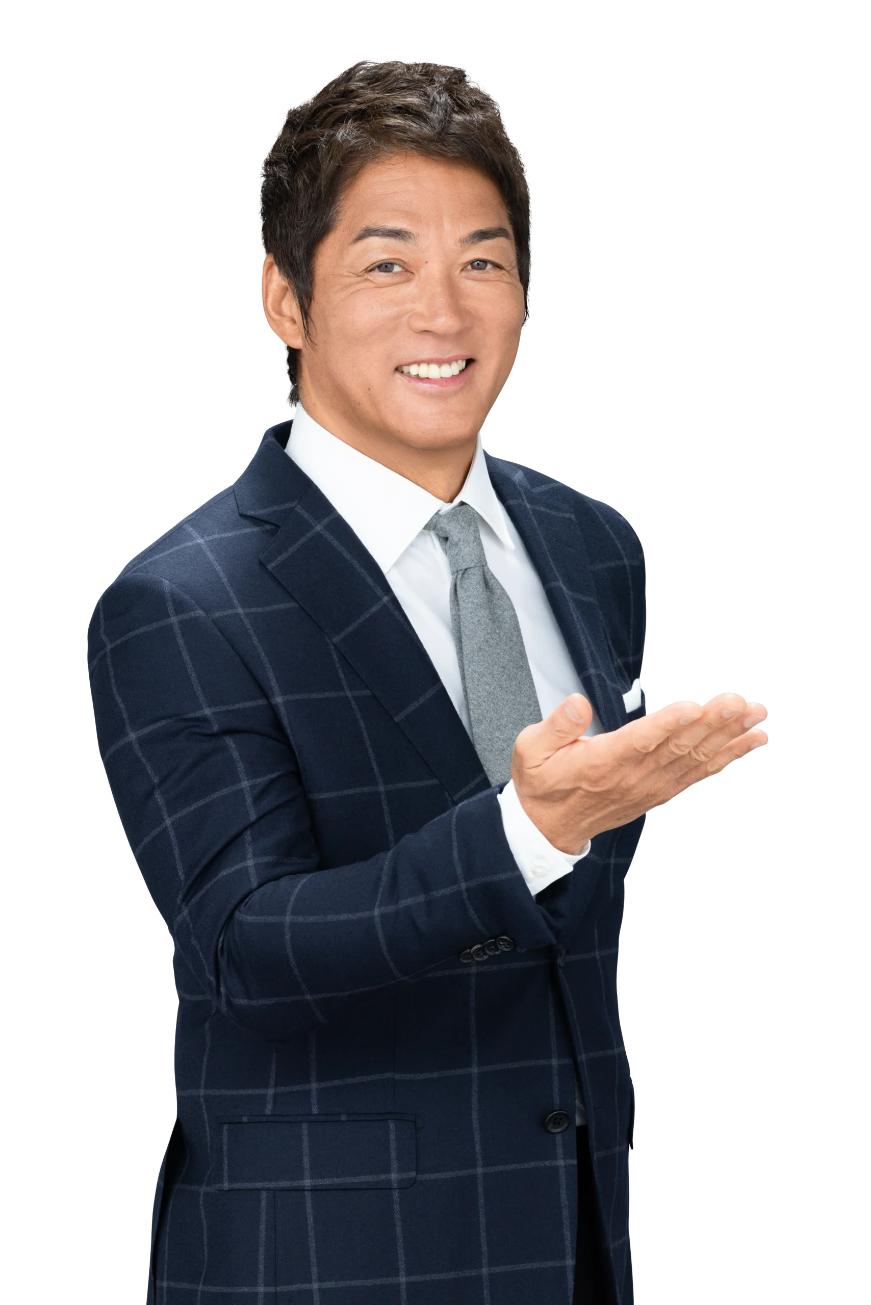 スーツ姿で手を差し出す長嶋一茂さん